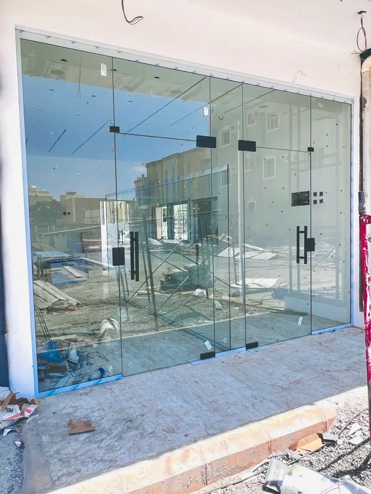 Frameless toughened glass shopfront with patch fittings